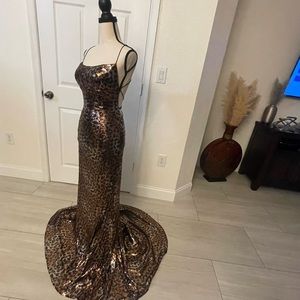 Sherri Hill size 4 leopard sequins black gold and silver , crisscross straps